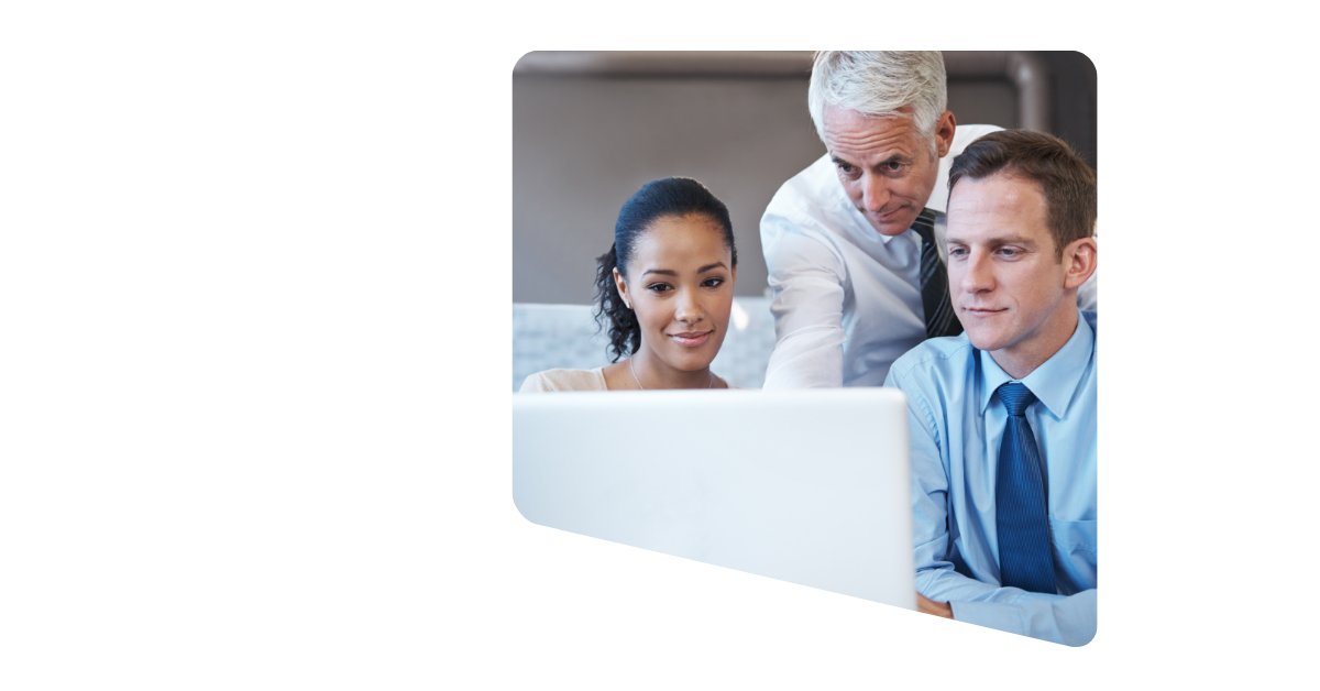 A middle-aged professional points at a laptop while a couple smiles and looks at the screen, showcasing engagement, satisfaction, and clear guidance during a business or financial discussion.